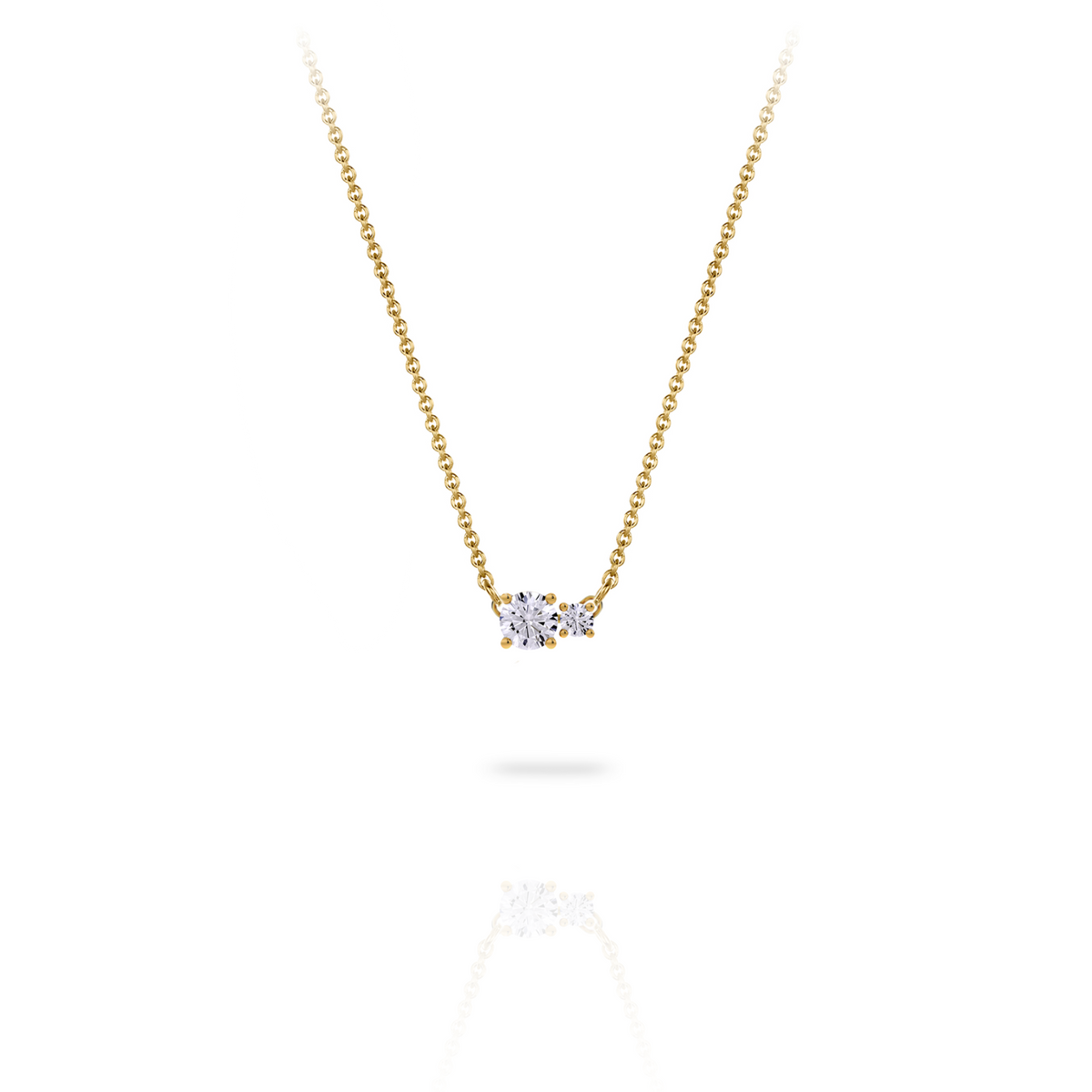 Necklace in 18K yellow gold with a central 0.25-carat diamond and a second smaller one, front view on white background. Elegant, streamlined design from the Essentials collection by Nayestones.
