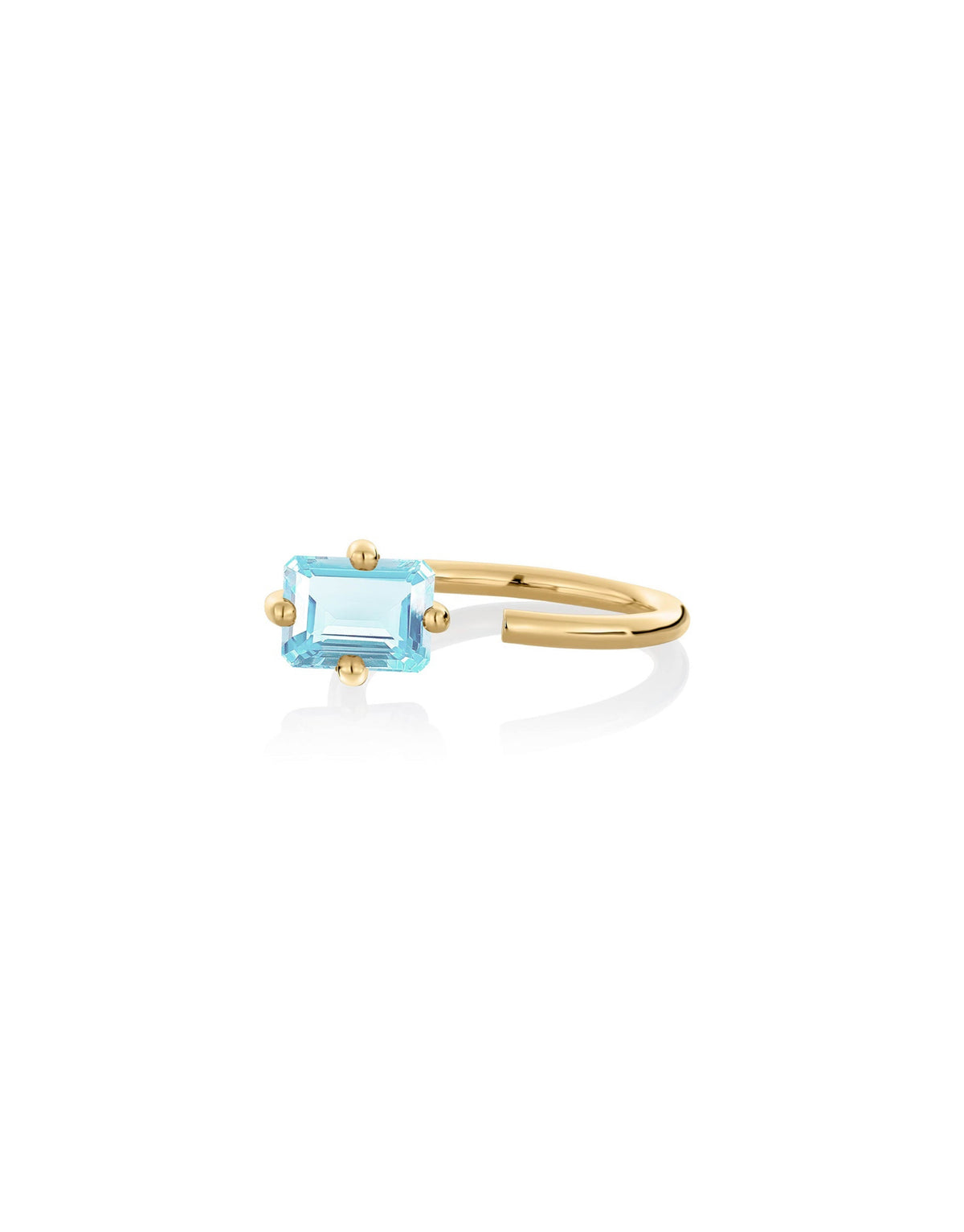 Octogone Ring in 9K yellow gold with an octagon cut sky blue topaz by Nayestones, Belgian fine jewelry.