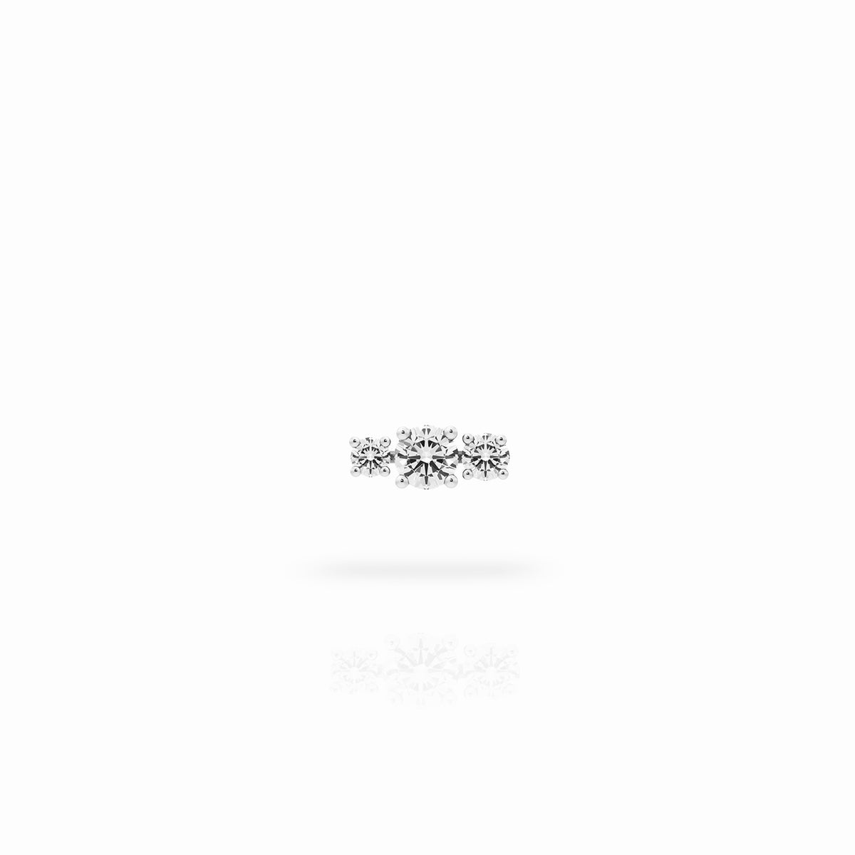 Trilogy earring in 18K yellow gold with a 0.70 carat center diamond stone and two smaller diamonds on the sides, on a white background. By Nayestones, Belgian fine jewelry brand.