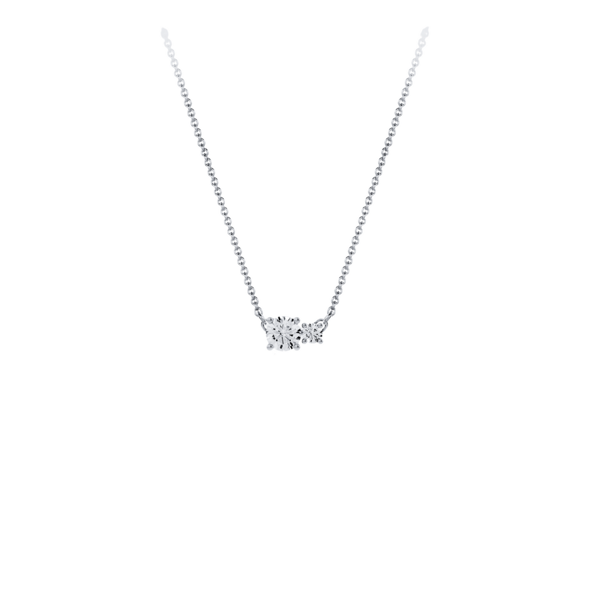 Necklace in 18K white gold with a central 0.50-carat diamond and a second smaller one, front view on white background. Elegant, streamlined design from the Essentials collection by Nayestones.