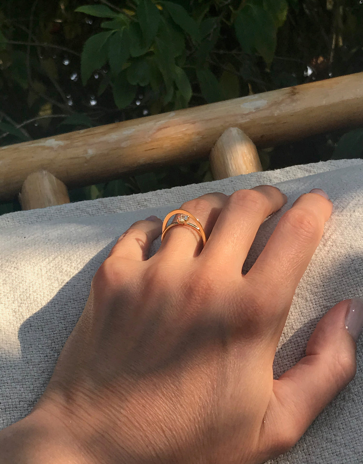 Moon Ellipse engagement solitaire ring in 18k yellow gold with a 0.25 carats diamond by Nayestones, Belgian fine jewelry.