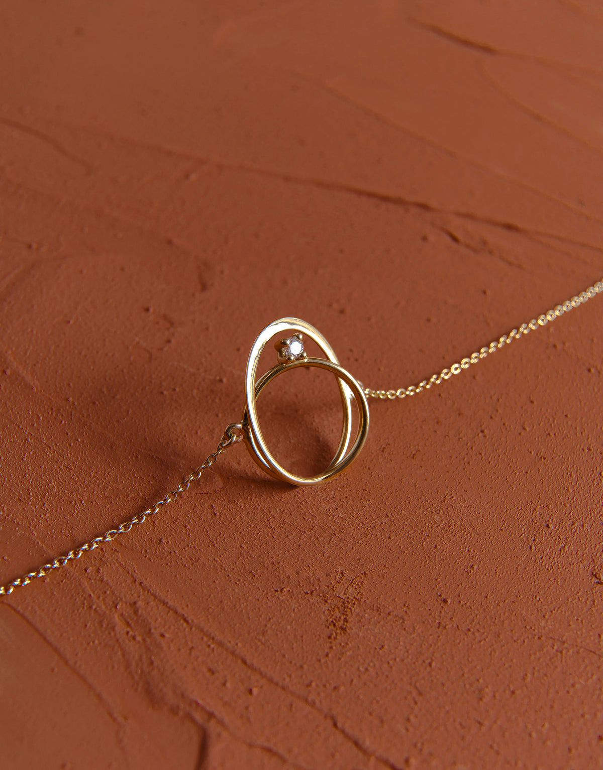 Moon Ellipse bracelet in 18K yellow gold with 0.05 carats diamond by Nayestones, Belgian fine jewelry.
