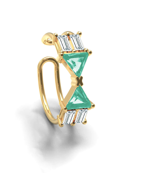 Nayestones' ear cuff featuring two triangle emeralds and four baguette diamonds, responsibly crafted in Antwerp using 18-karat gold.
