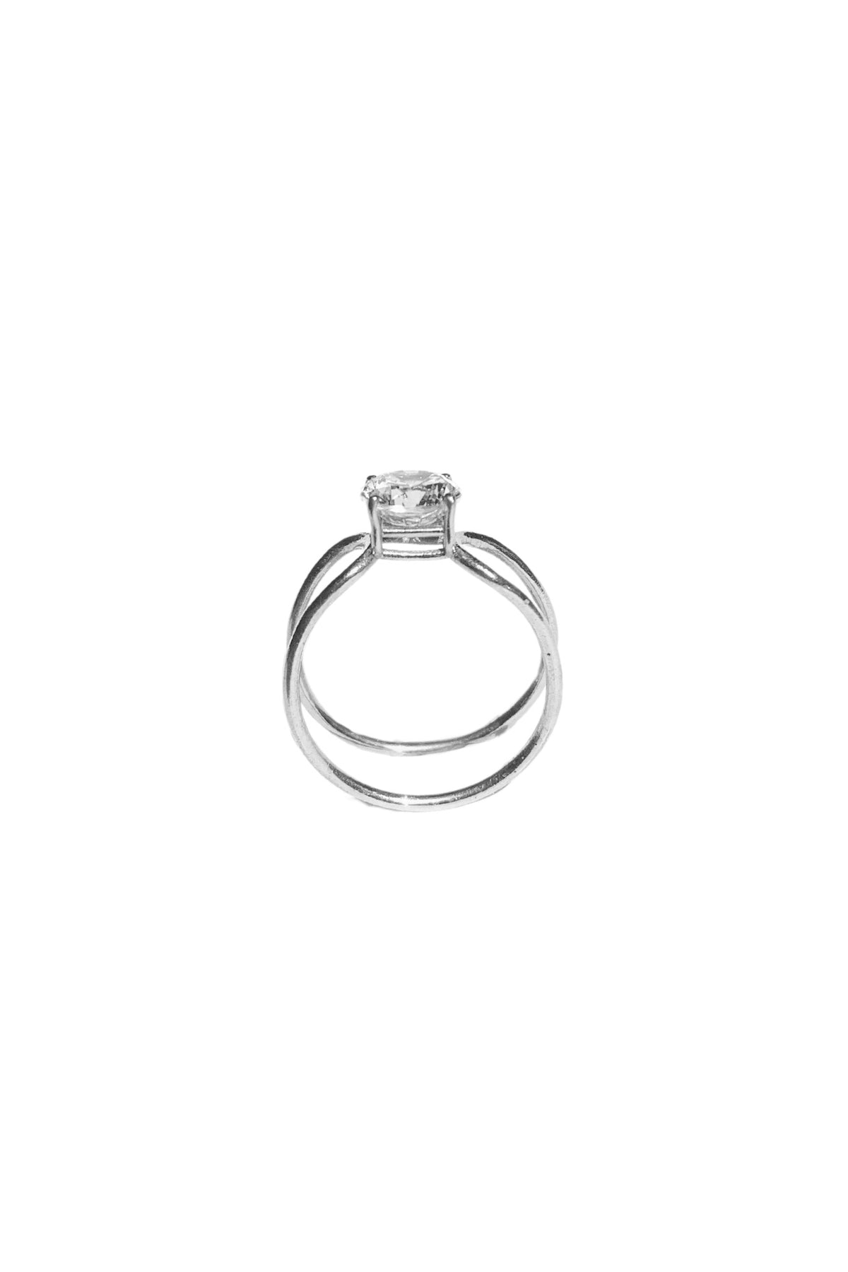 Double C Solitaire Diamond Ring in 18k white gold with a 1ct round-cut diamond by Nayestones, Belgian Fine Jewelry.