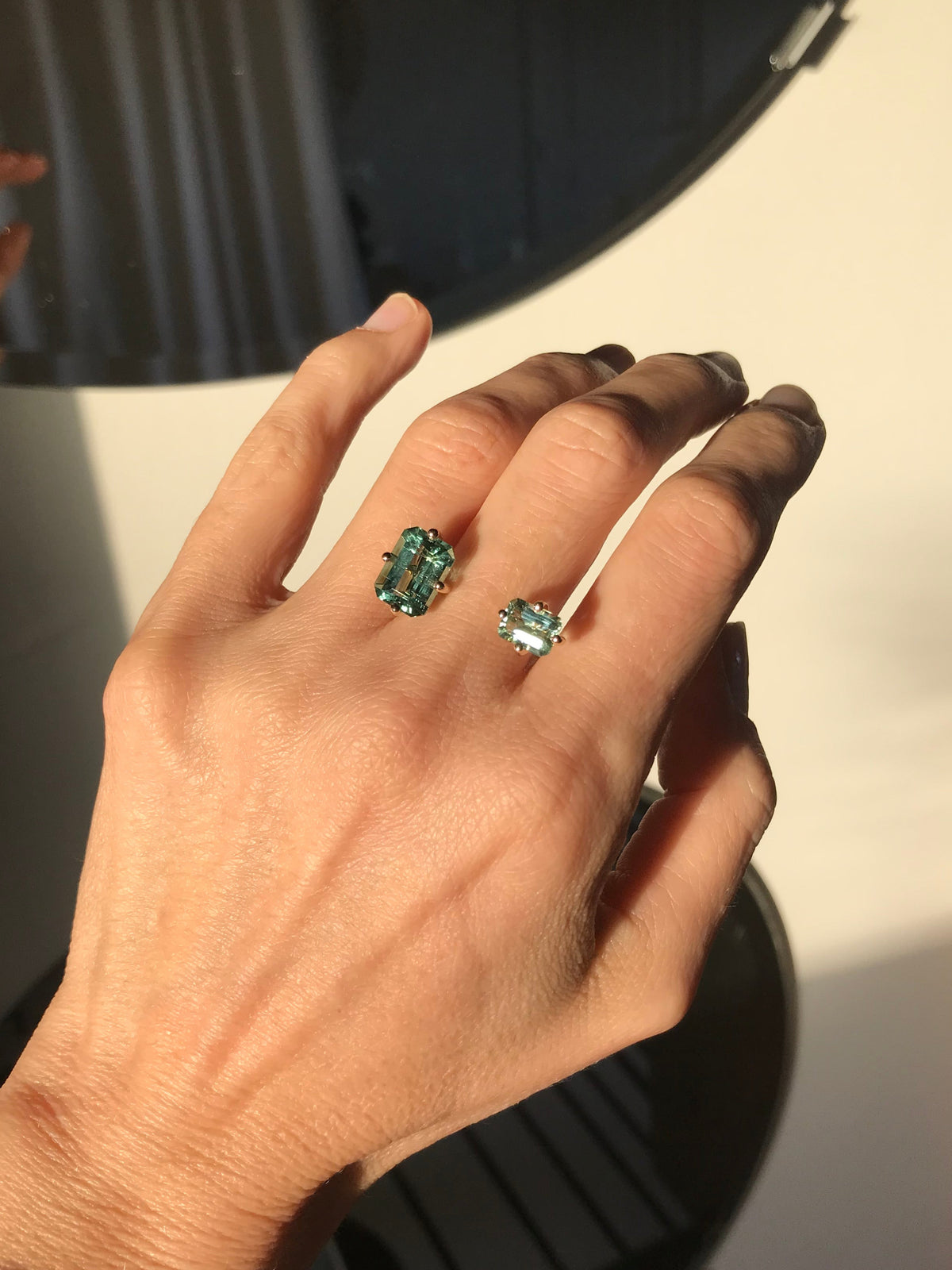 Signature Double Octogone Ring in 9k yellow gold with two octagon cut stones one light blue topaz and one blue topaz by Nayestones, Belgian Fine Jewelry.