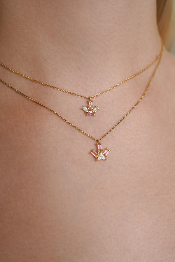 Two Pyramid Ray necklaces elegantly stacked, crafted in 18-karat gold, showcasing an innovative design by Nayestones and meticulously handcrafted in Antwerp