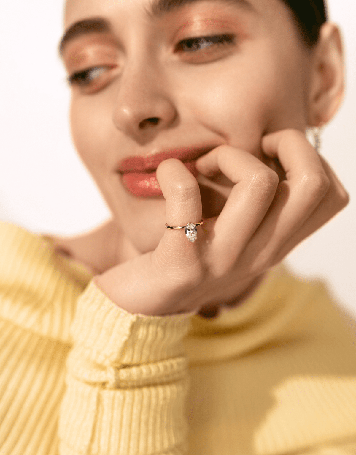 Signature Petite Bloom ring in 9k yellow gold with a center hite topaz stone by Nayestones, Belgian Fine Jewelry. 