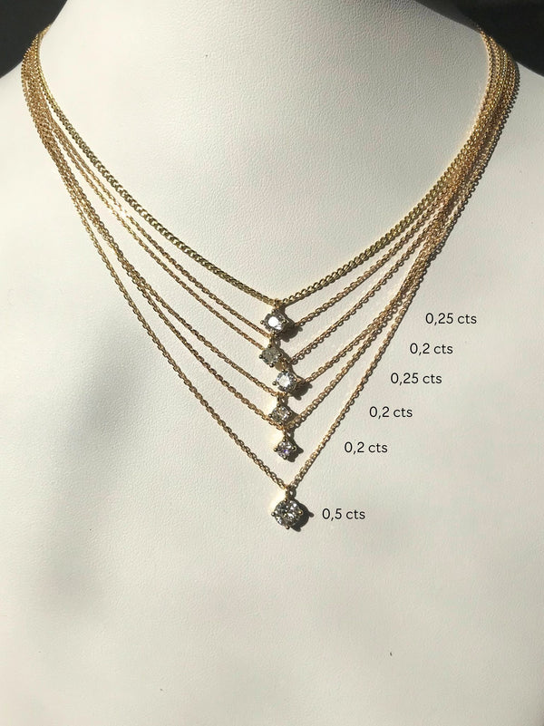 Solitaire Diamond Necklace in 18k yellow gold with a round cut diamond in 0.25, 0.2, 0.5 carats diamond by Nayestones, Belgian Fine Jewelry.  Nayestones