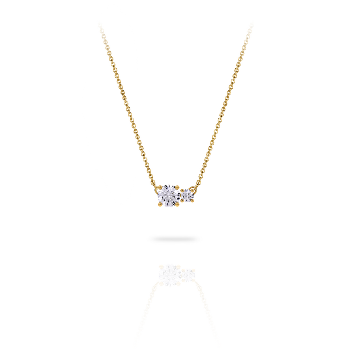 Necklace in 18K yellow gold with a central 0.70-carat diamond and a second smaller one, front view on white background. Elegant, streamlined design from the Essentials collection by Nayestones.