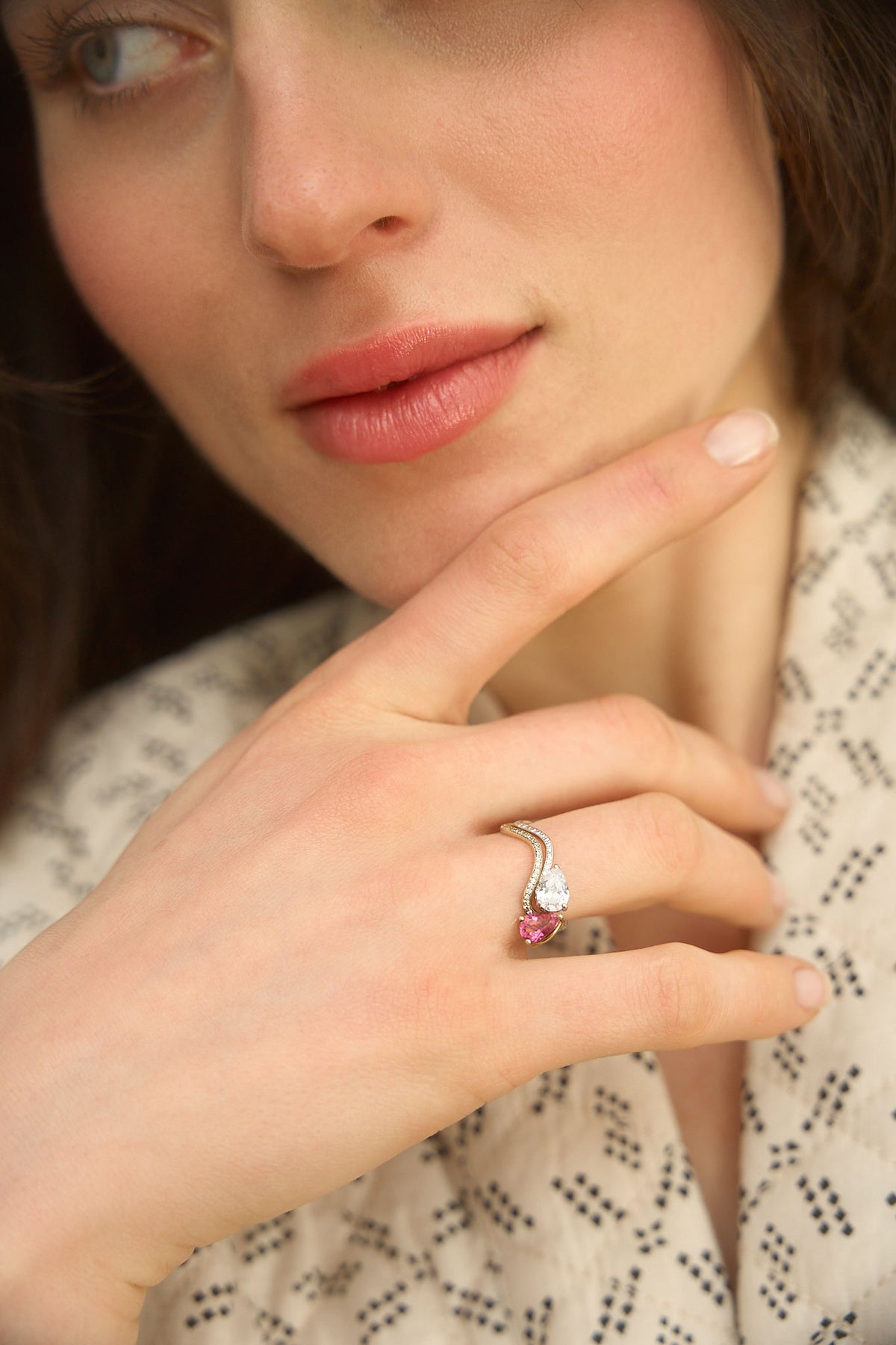 Model wearing the Petite Comete Stella diamond ring in white gold stacked with the Petite Comete pavé pink tourmaline ring