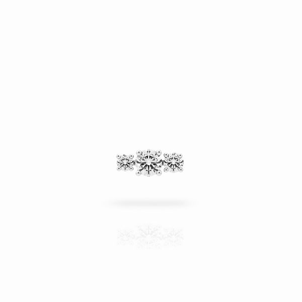 Trilogy earring in 18K yellow gold with a 0.70 carat center diamond stone and two smaller diamonds on the sides, on a white background. By Nayestones, Belgian fine jewelry brand. Nayestones