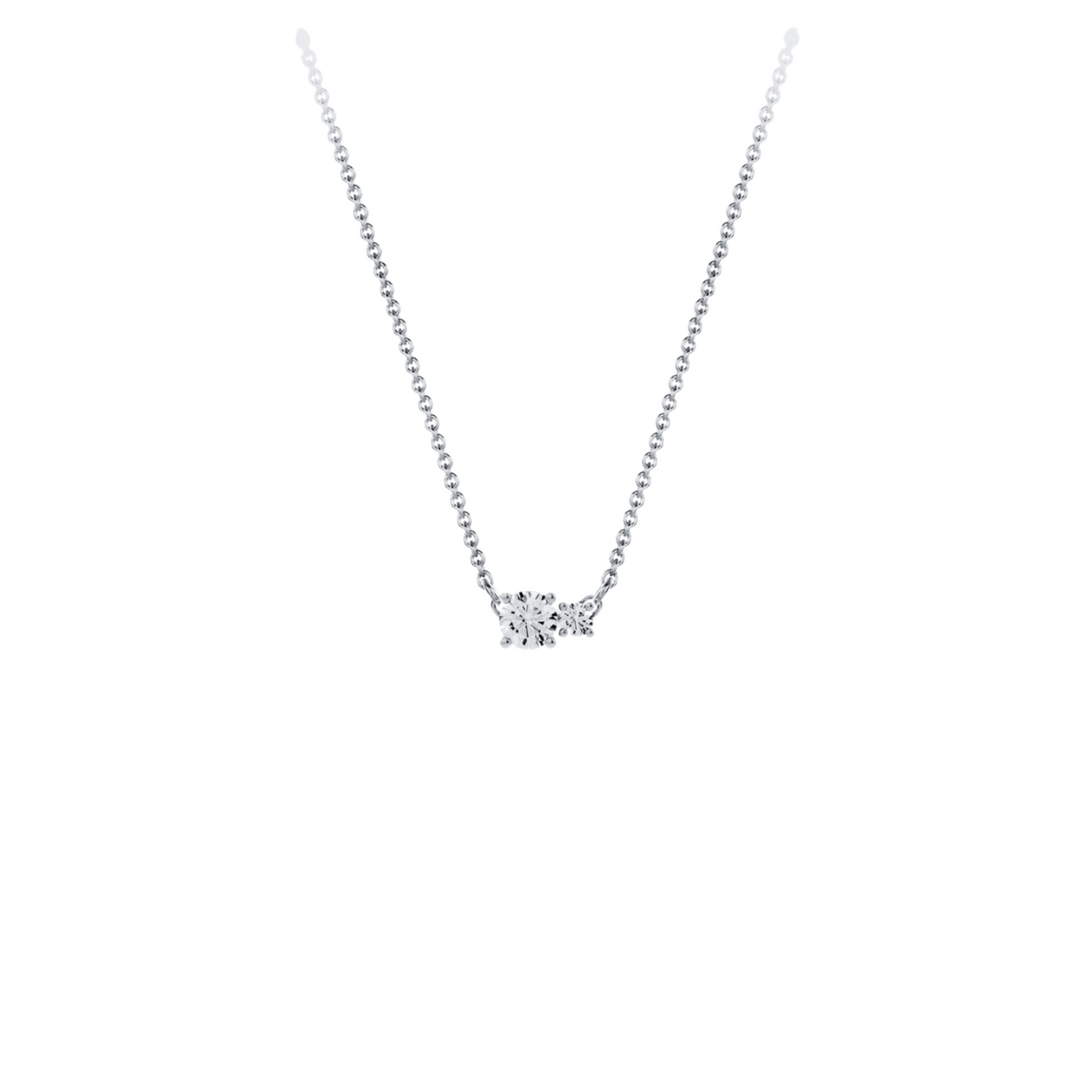 Necklace in 18K white gold with a central 0.25-carat diamond and a second smaller one, front view on white background. Elegant, streamlined design from the Essentials collection by Nayestones.