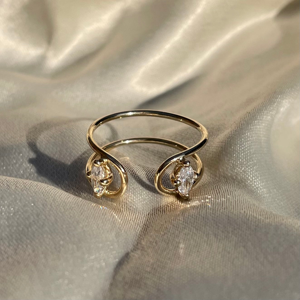 Double C Marquise Engagement Ring in 18K Gold with two Marquise Cut White Diamonds by Nayestones, Belgian fine jewelry. 