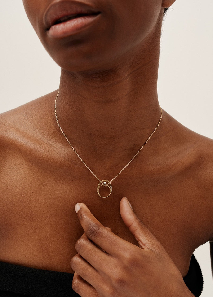 18K sustainable gold necklace adorned with a brilliant 0.05ct white diamond. Pendant height measures 1.5cm - creative fine jewelry made in Antwerp