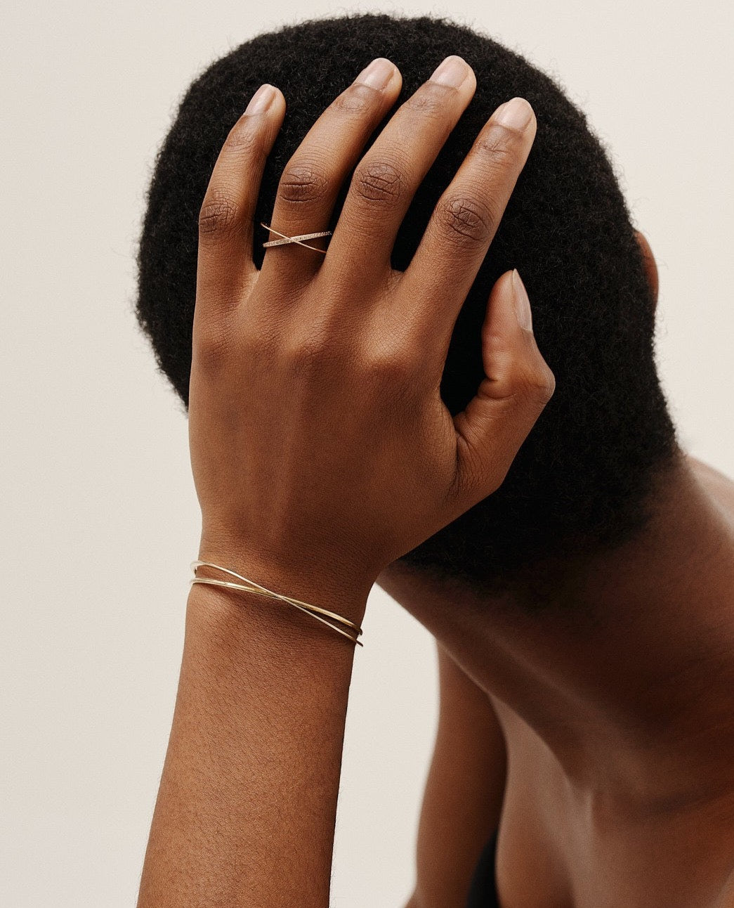 Moon Ellipse Open bracelet in 18K yellow gold paired with moon ellipse pavé ring by Nayestones, Belgian fine jewelry. 